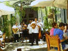 Troubadors at outdoor restaurant
